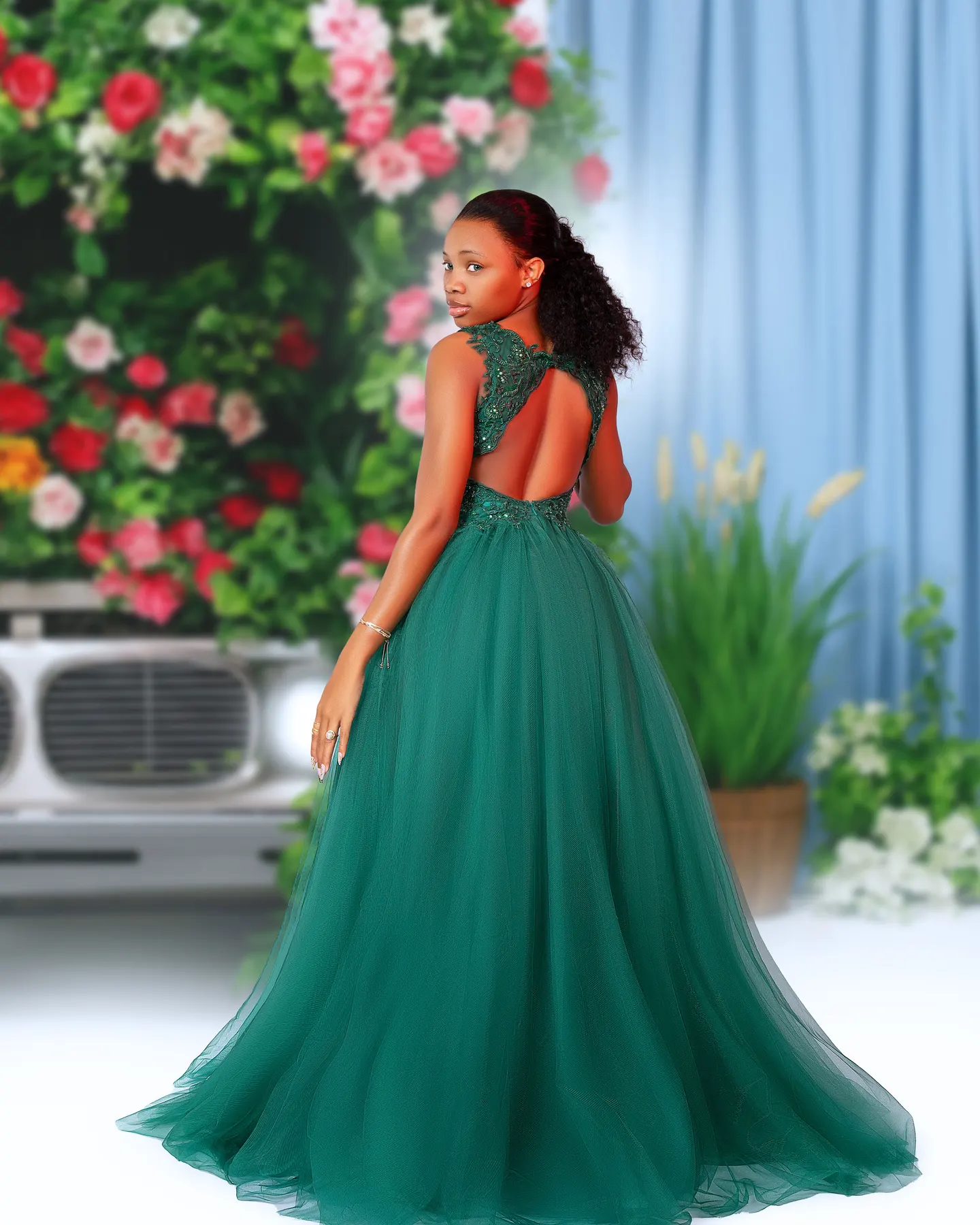 Studio portrait with a floral garden backdrop